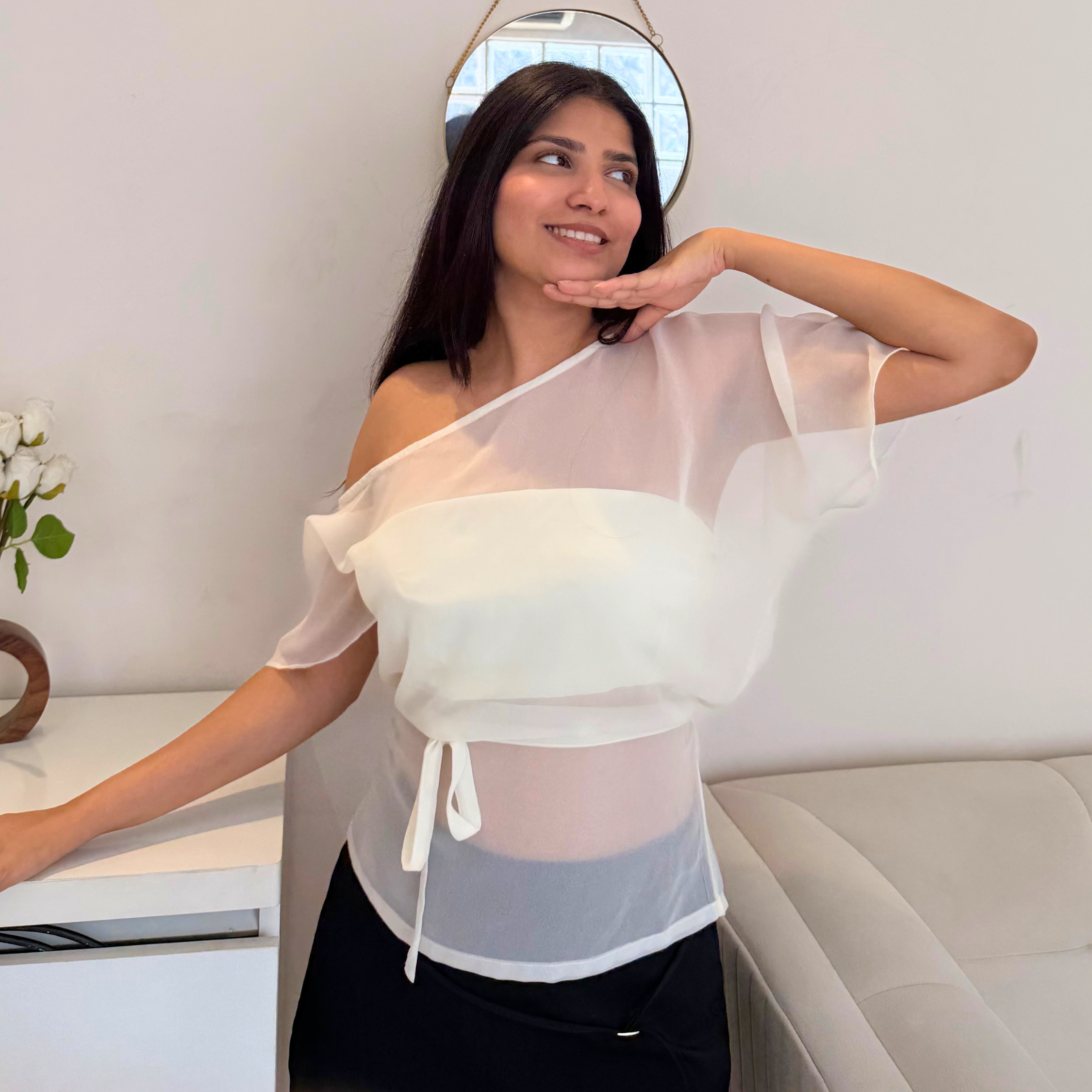Solenne flowy georgette top styled with a front bow detail